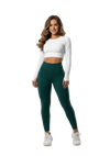 A woman modeling a matching activewear set consisting of a white long-sleeve crop top and dark green high-waisted leggings, set against a plain white background.