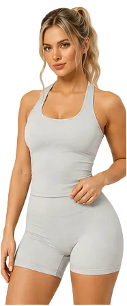 A woman modeling a light gray ribbed tank top and matching high-waisted shorts against a plain beige studio background.