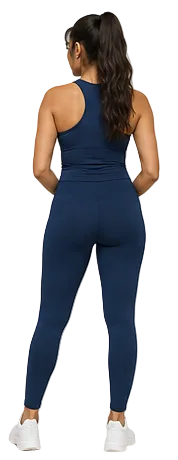 A woman shown from the back wearing a navy blue racerback tank top and matching high-waisted leggings, paired with white sneakers, against a plain white background.