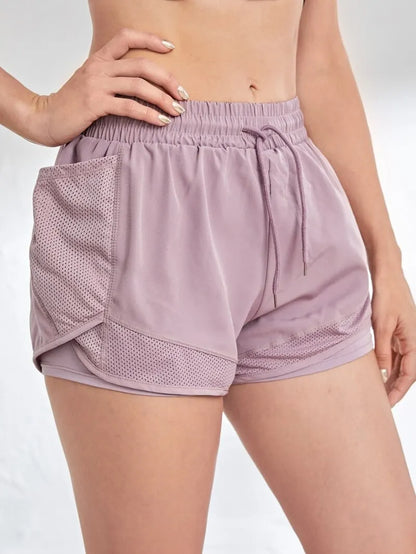 2-in-1 sports shorts with pockets and built-in leggings for women