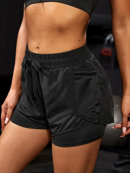 2-in-1 sports shorts with pockets and built-in leggings for women