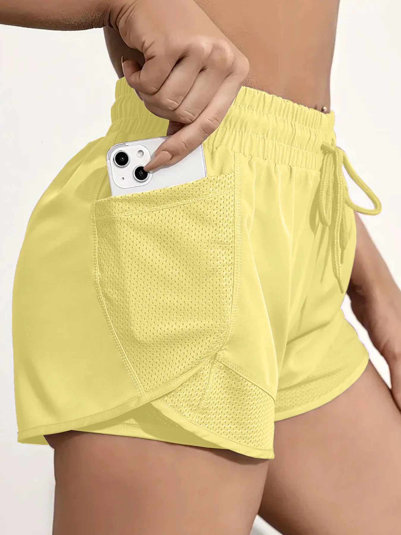 2-in-1 sports shorts with pockets and built-in leggings for women