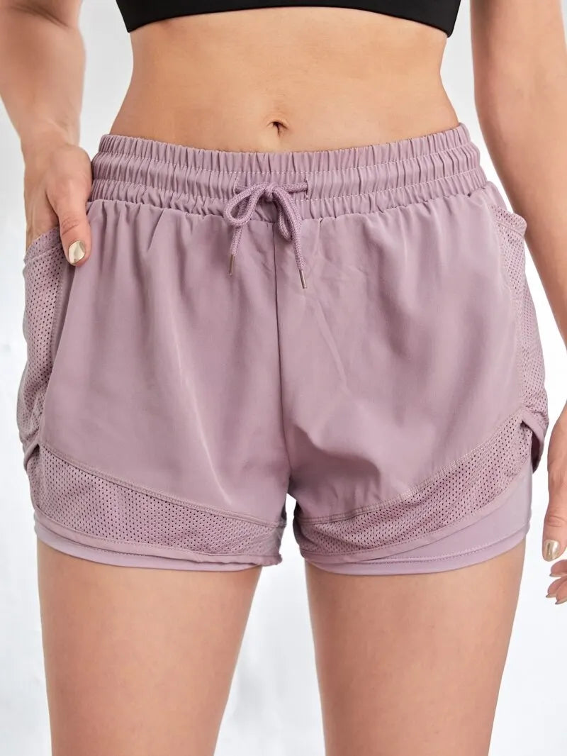 2-in-1 sports shorts with pockets and built-in leggings for women